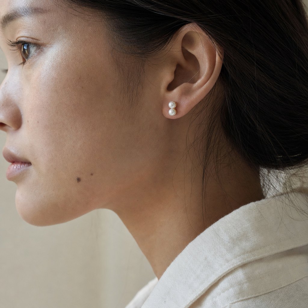 The Double Pearl Stud wearing close image.